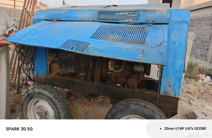 مولد كهرباء كبير مع مكينه لحام 6