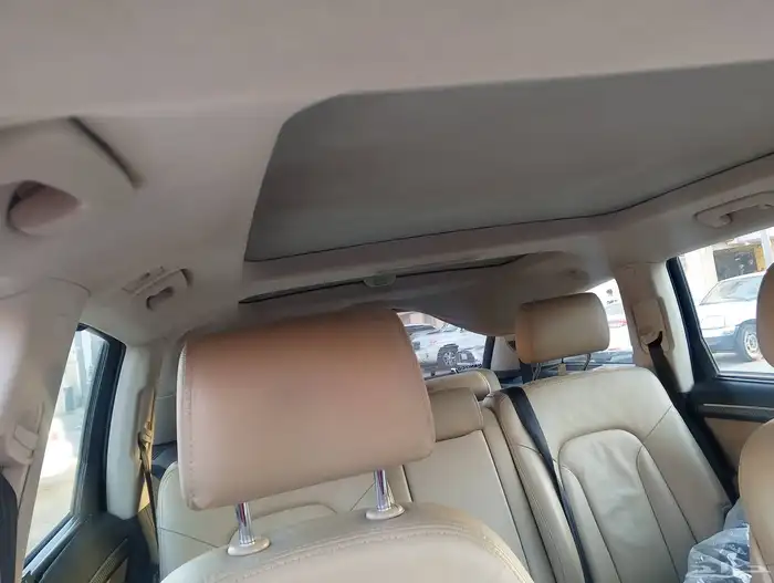 تغيير الداخلية لسيارة أودي سقف شموا أسود مع خياط طارة لونين 1