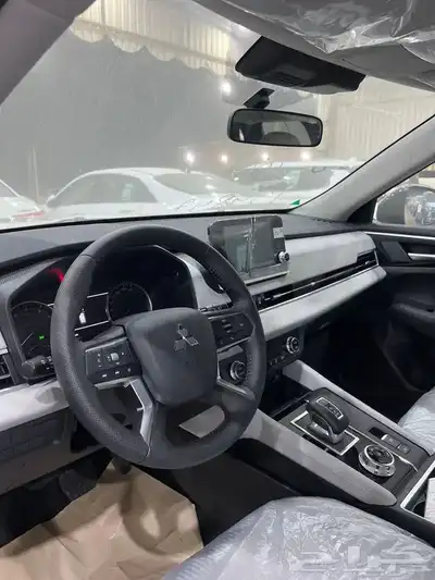 ميتسوبيشي اوتلاندر 2025 ب 96900 شامل 7 مقاعد بصمة عرض خااص index