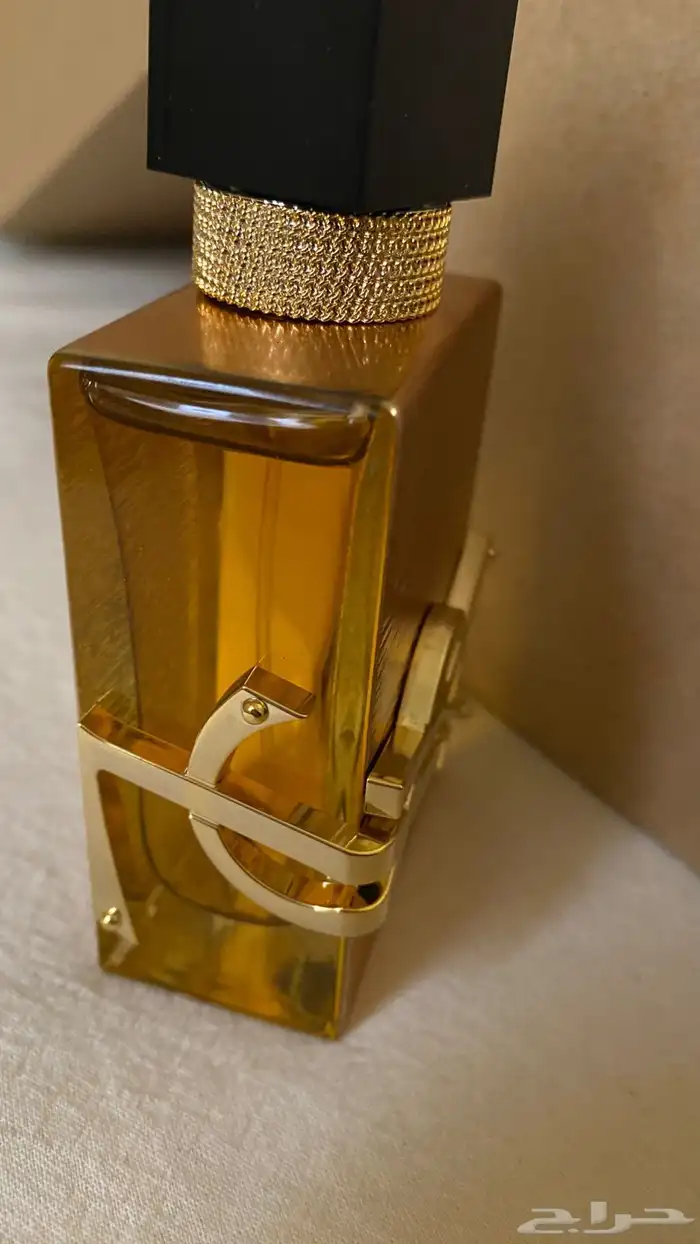 عطر إيف سان لوران إصدار ذهبي مستعمل استعمال خفيف جدا  رشتين 1