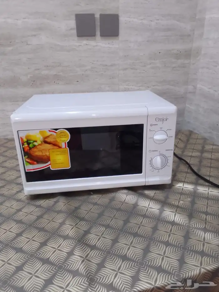 مايكرويف كهربائي لتسخين الاكل استخدام نظيف 1