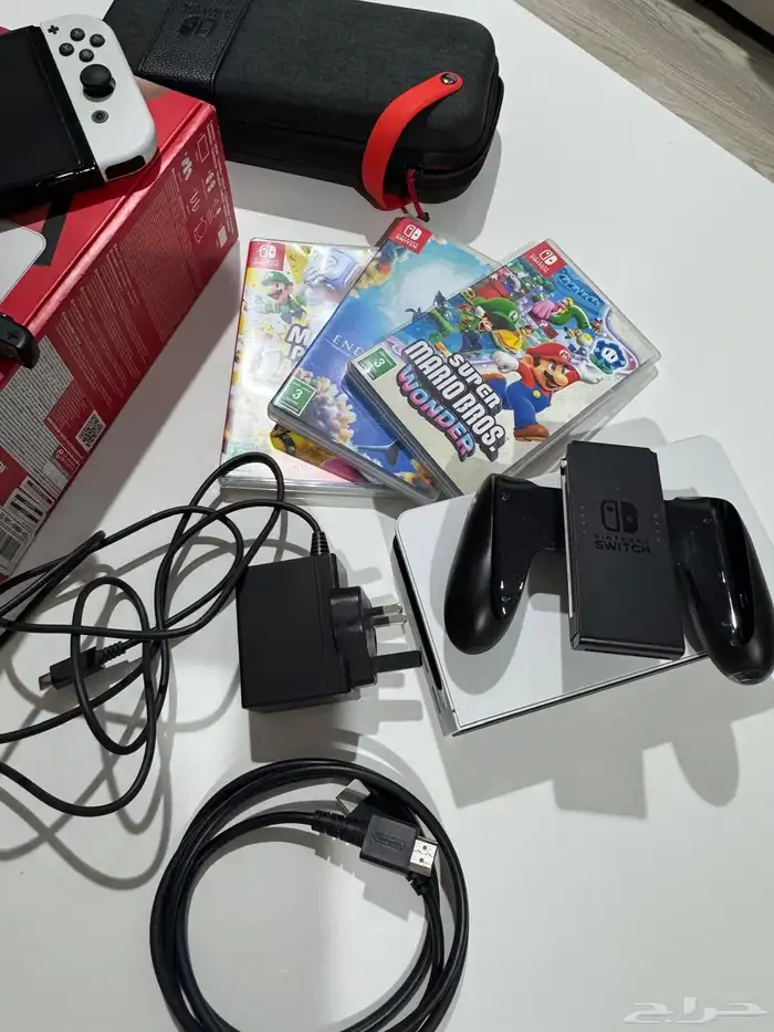 نينتيندو سويتش اوليد(ابيض) Nintendo switch oled(white) مع ال 4