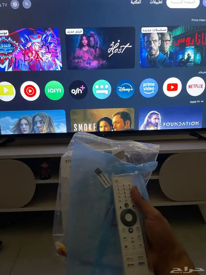 تلفزيون 55 بوصة مع الطاولة 1