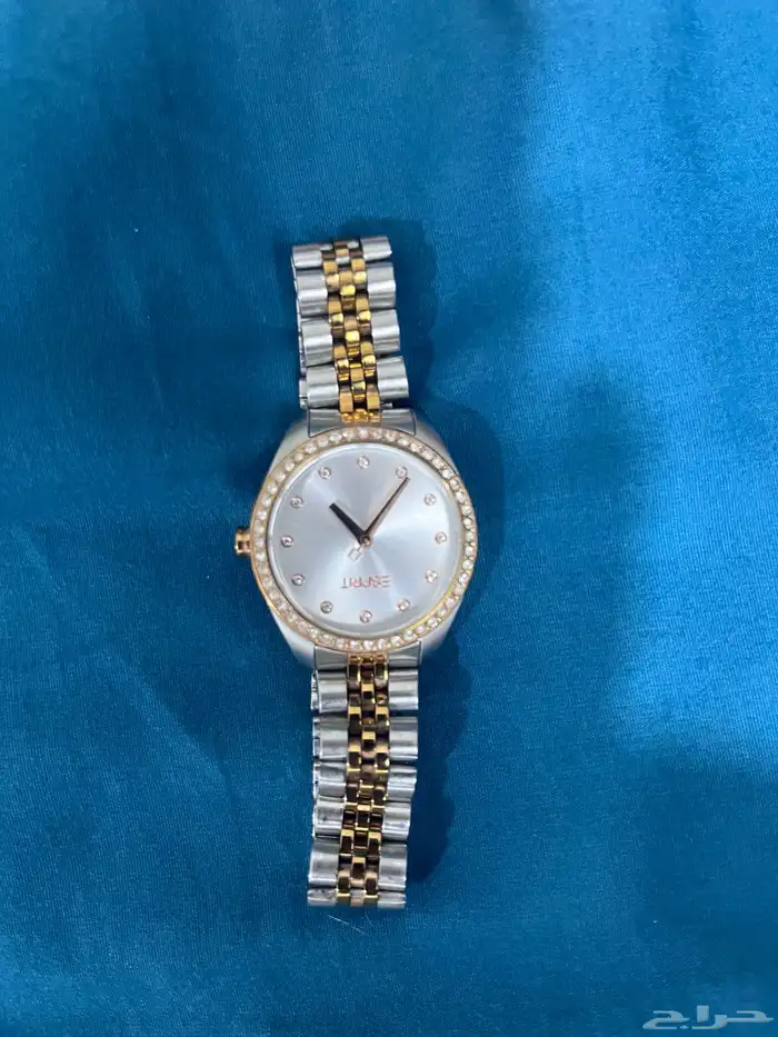 ساعه نسائيه شبه جديده 1