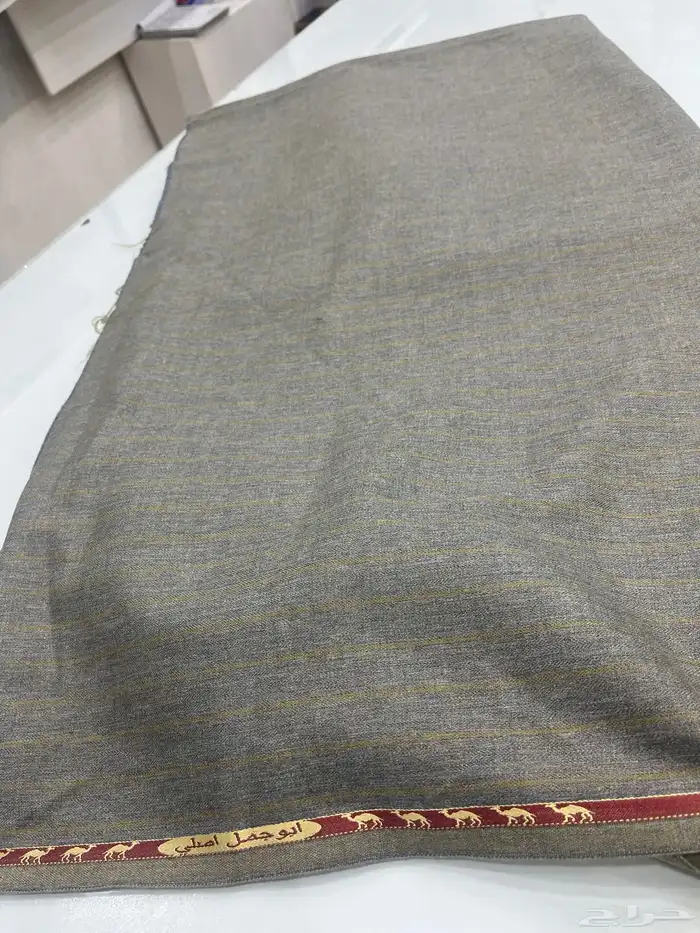 للبيع قماش رجالي شتوي من صوف الكشمير من ماركة أبو جمل أصلي 2