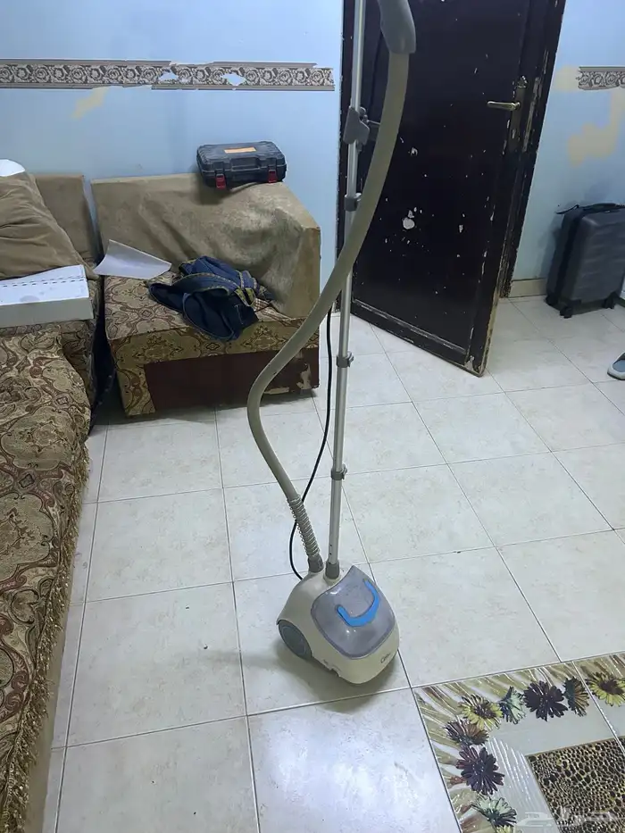 سرير هزاز ومكوات بخاروحوض سمك وقفص كبير 1