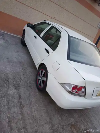 متسوبيسي لانسر بومة 2004 index