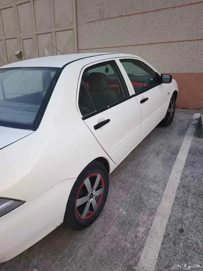 متسوبيسي لانسر بومة 2004 7