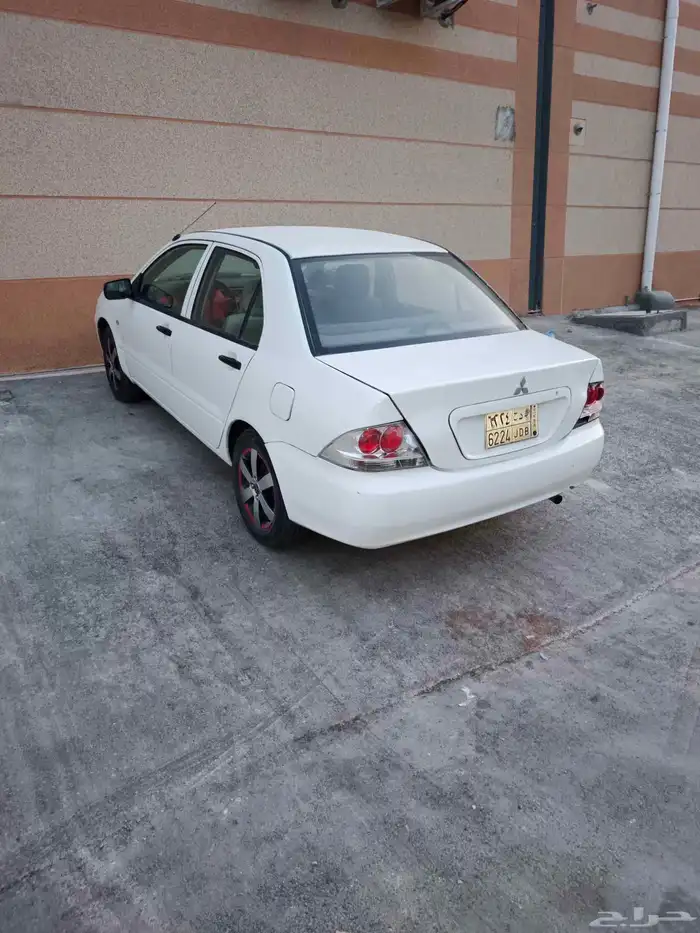 متسوبيسي لانسر بومة 2004 9