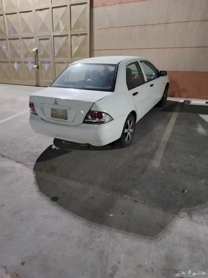 متسوبيسي لانسر بومة 2004 3