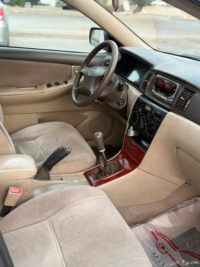 تويوتا كورولا 2004 جير عادي زجاج كهربا 8