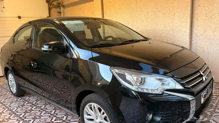 سيارة ميتسوبيشي اتراج فل كامل للبيع 9