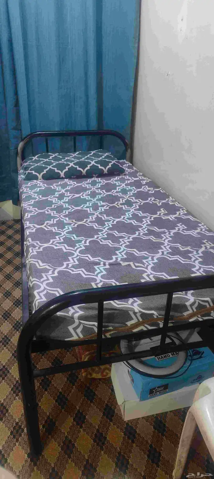 single metal bed with metres and pillow 0