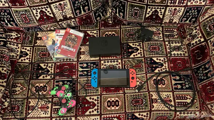 نينتيندو سويتش مع ألعابه وملحقاته 0