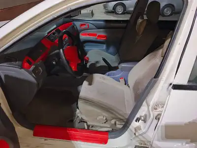 متسوبيسي لانسر بومة 2004 index