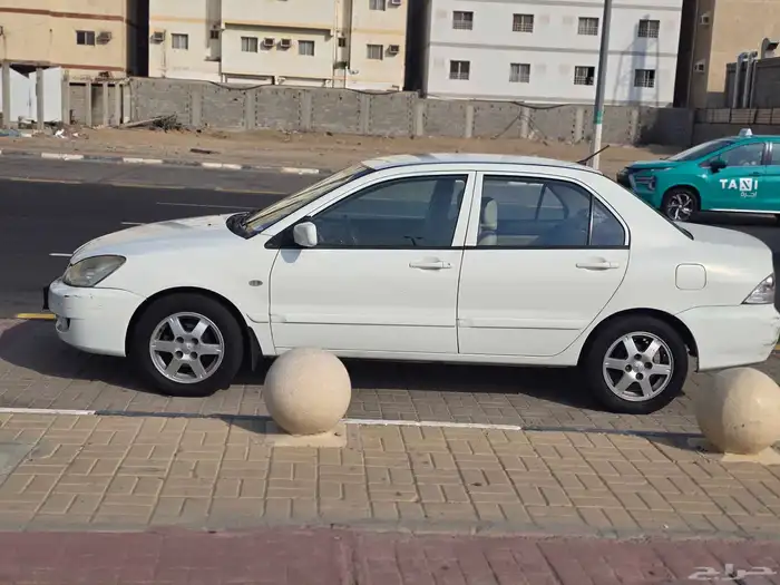 متسوبيشى لانسر 2009 اتوماتيك 6