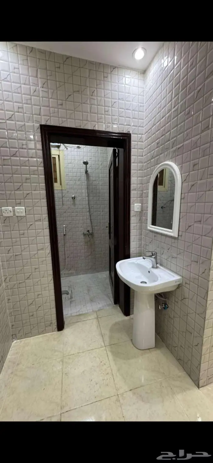 شقة دور ارضي مع حوش حي السبيع 1