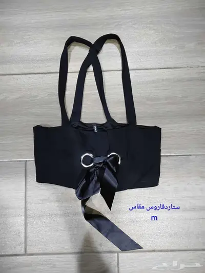 ملابس نسائيه توبات index