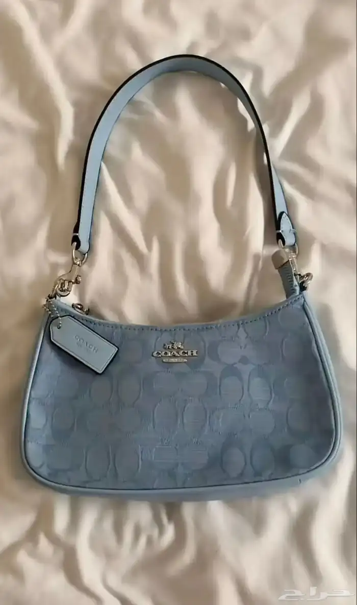 شنطة كوتش سماوي 0