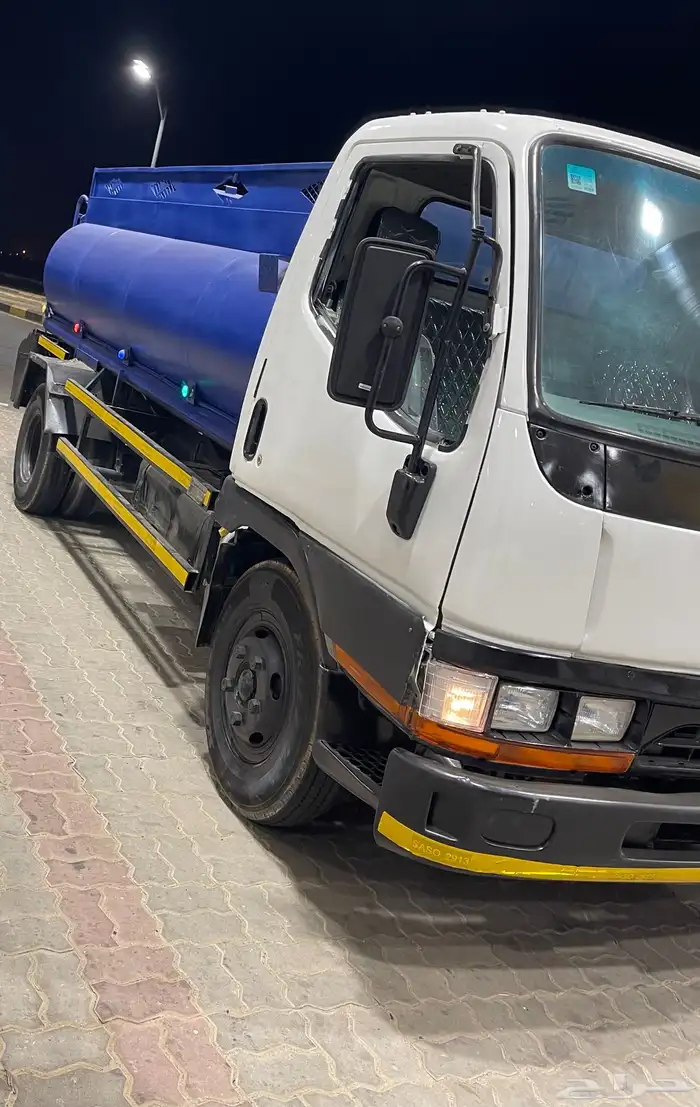 وايت ميستوبيشي كانتر موديل 2002 5