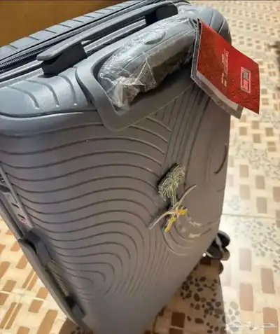 شنطة السفر شعار. index