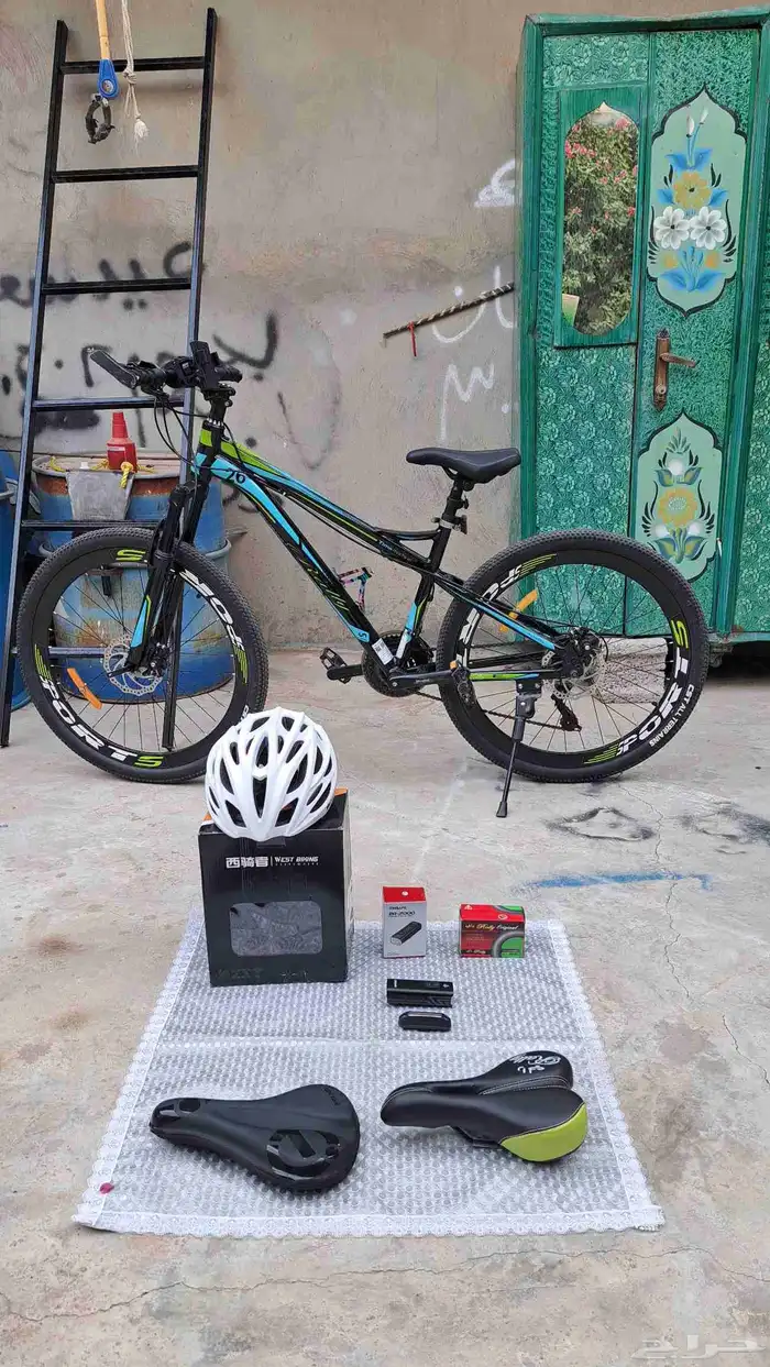 سيكل رياضي هجين من شركة رالي 21 سرعة و اكسسوراته 0