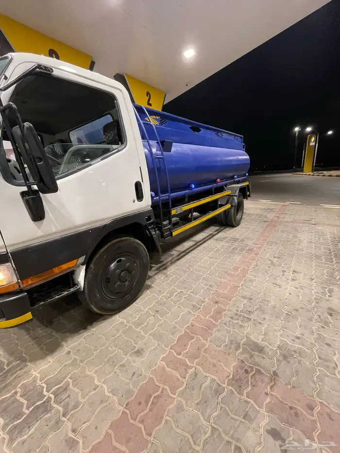 وايت ميستوبيشي كانتر موديل 2002 11