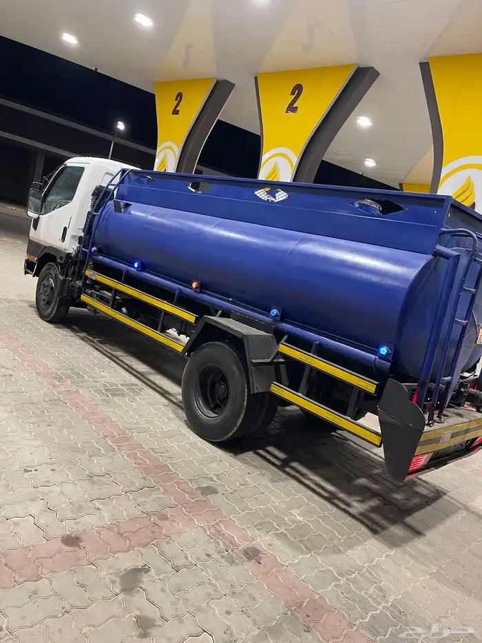 وايت ميستوبيشي كانتر موديل 2002 8