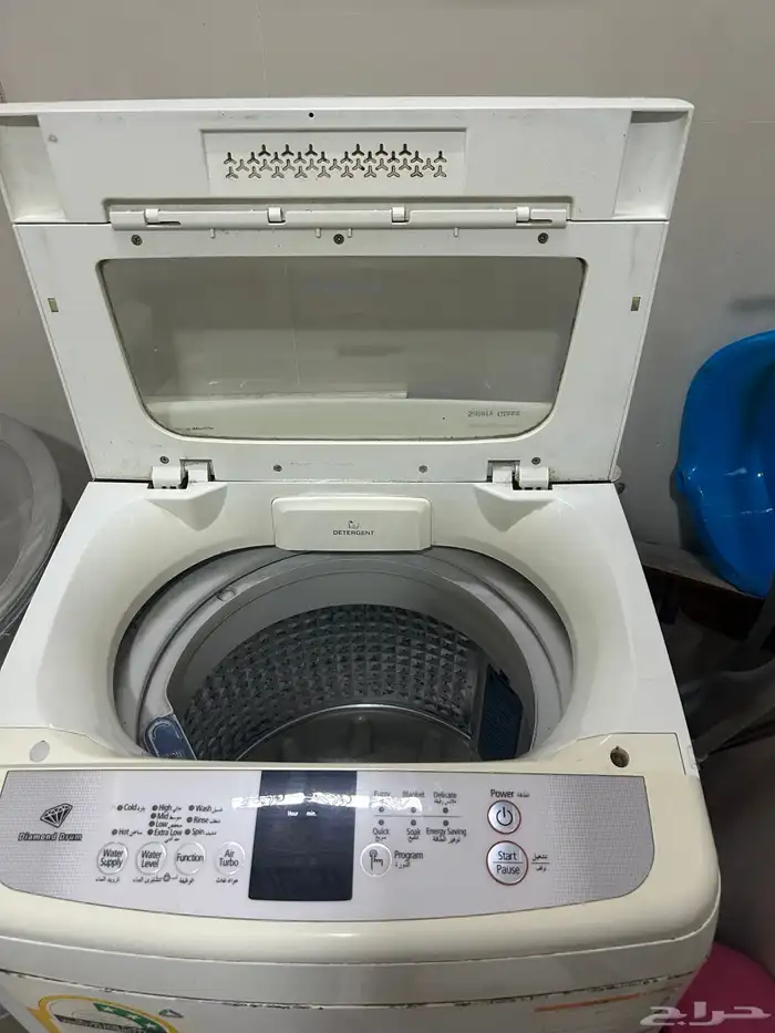 غسالة تعبئة علوية بحالة جيدة مع ميكرويف يلزمه اصلاح 1