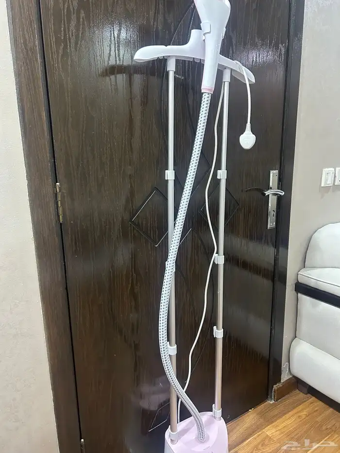 مكواة ملابس جديده والشركه معروفه واصليه وفيها تعديل الطول 1