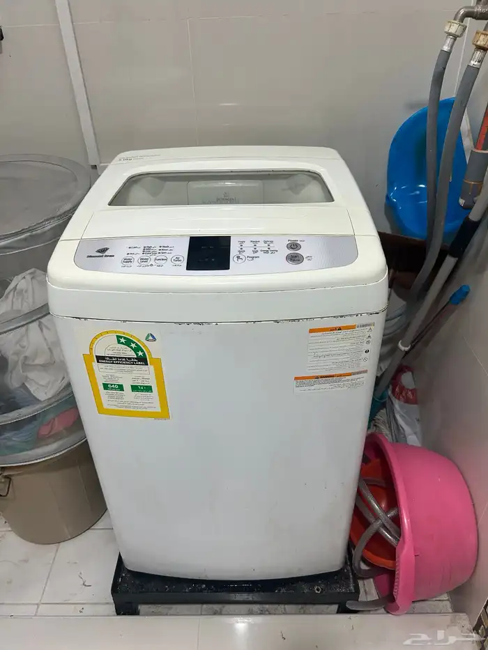 غسالة تعبئة علوية بحالة جيدة مع ميكرويف يلزمه اصلاح 0