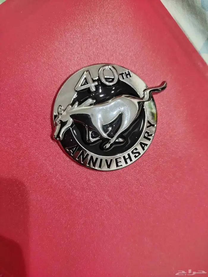 Ford mustard 40th anniversary badge 1