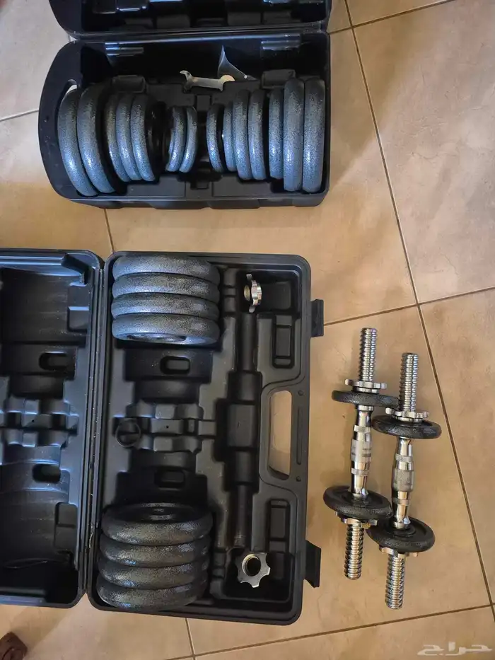 أوزان جيم 20 و30 وكرسي جديد لم يستخدم 1