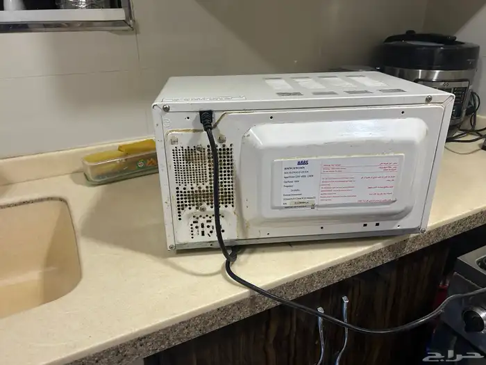 غسالة تعبئة علوية بحالة جيدة مع ميكرويف يلزمه اصلاح 4