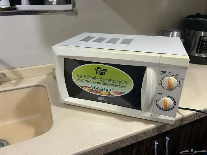 غسالة تعبئة علوية بحالة جيدة مع ميكرويف يلزمه اصلاح 3