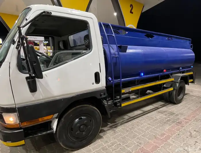 وايت ميستوبيشي كانتر موديل 2002 13