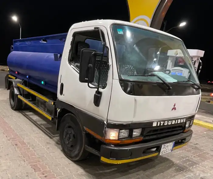 وايت ميستوبيشي كانتر موديل 2002 1