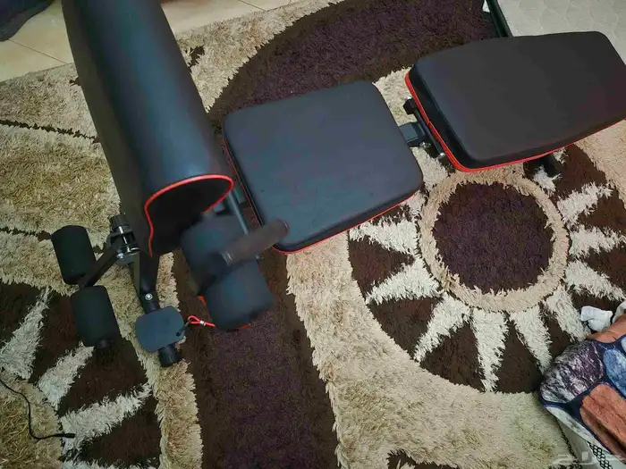 أوزان جيم 20 و30 وكرسي جديد لم يستخدم 2