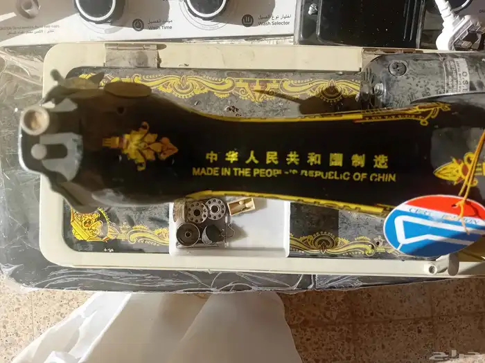 آلة خياطه مخزنة 1