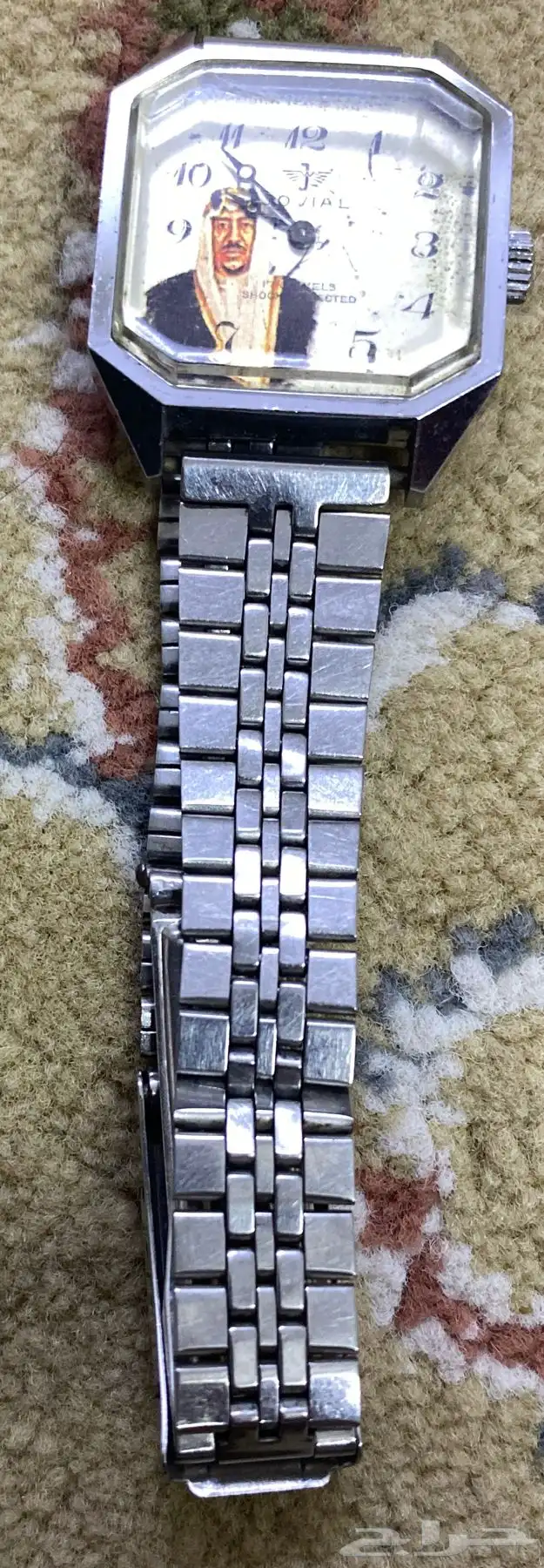 ساعه عليها صورة الملك سعود 0