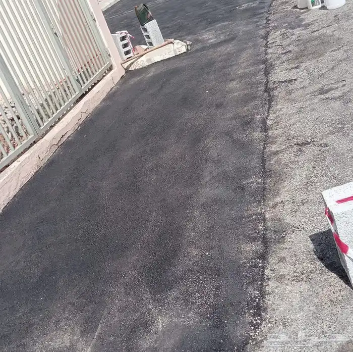 أعمال اسفلت أمام المنازل والشركات أعمال فتحات كور 3