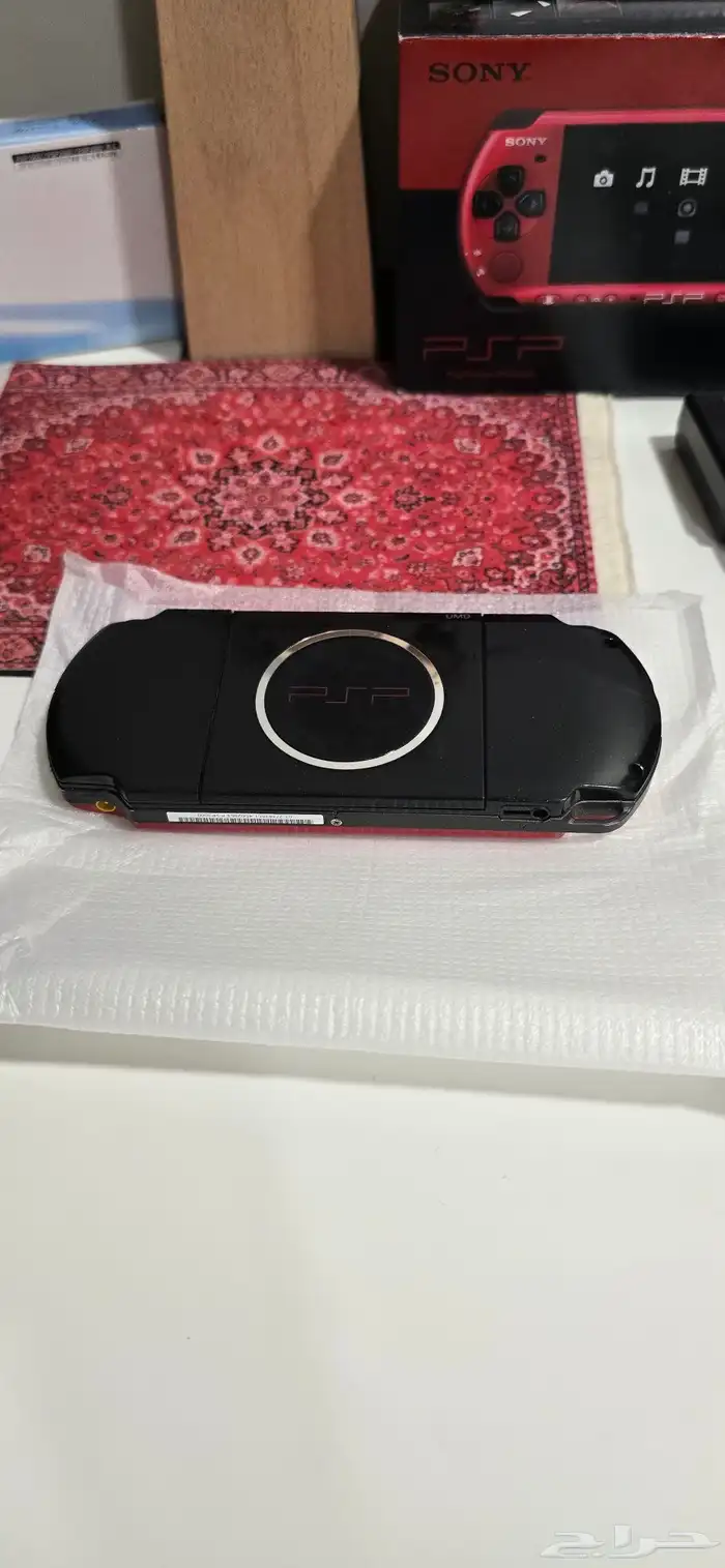 جهاز ياباني نادر بلونين الاحمر والاسود PSP3000 بكامل محتويات 3