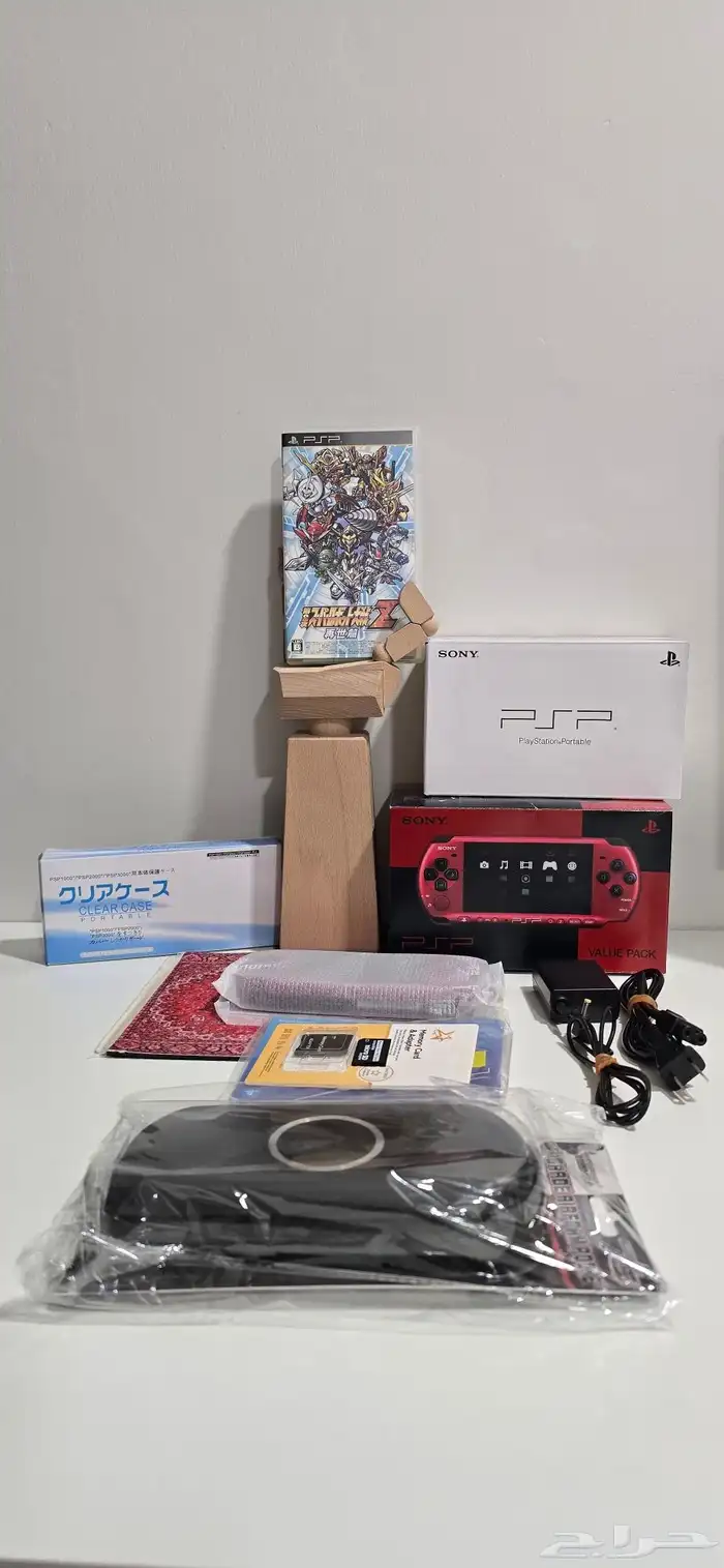 جهاز ياباني نادر بلونين الاحمر والاسود PSP3000 بكامل محتويات 1