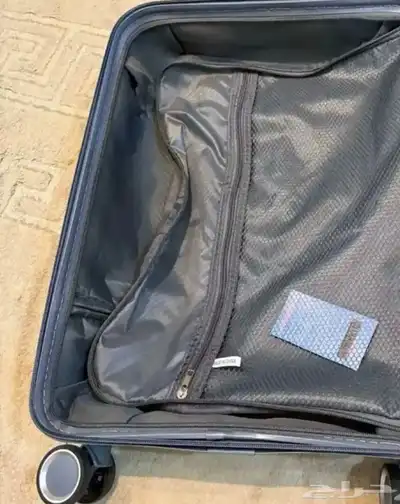 شنطة السفر شعار. index