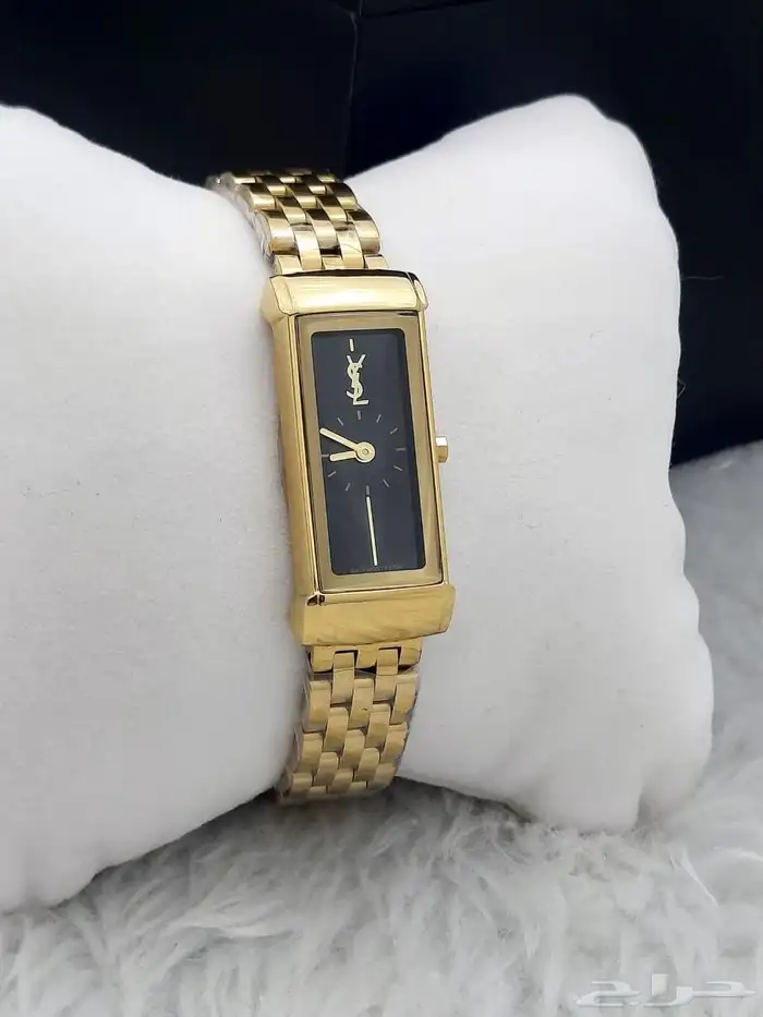 ساعة يد نسائية مستطيلة من إيف سان لوران بلونين  ذهبي وفضي. 1