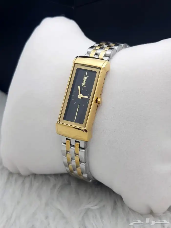 ساعة يد نسائية مستطيلة من إيف سان لوران بلونين  ذهبي وفضي. 3