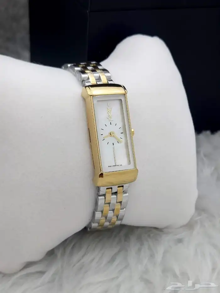 ساعة يد نسائية مستطيلة من إيف سان لوران بلونين  ذهبي وفضي. 2