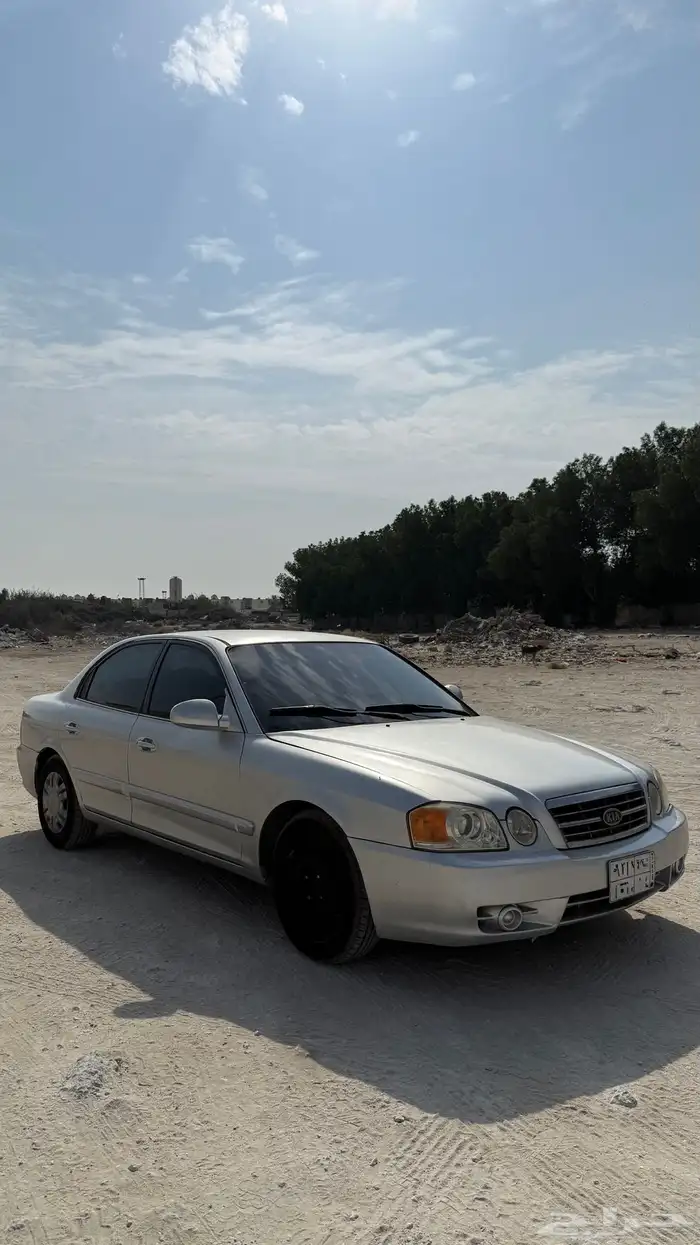 للبيع أوبتيما 2004 قير عادي مخزنه 4