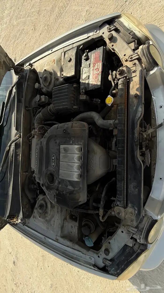 للبيع أوبتيما 2004 قير عادي مخزنه 8