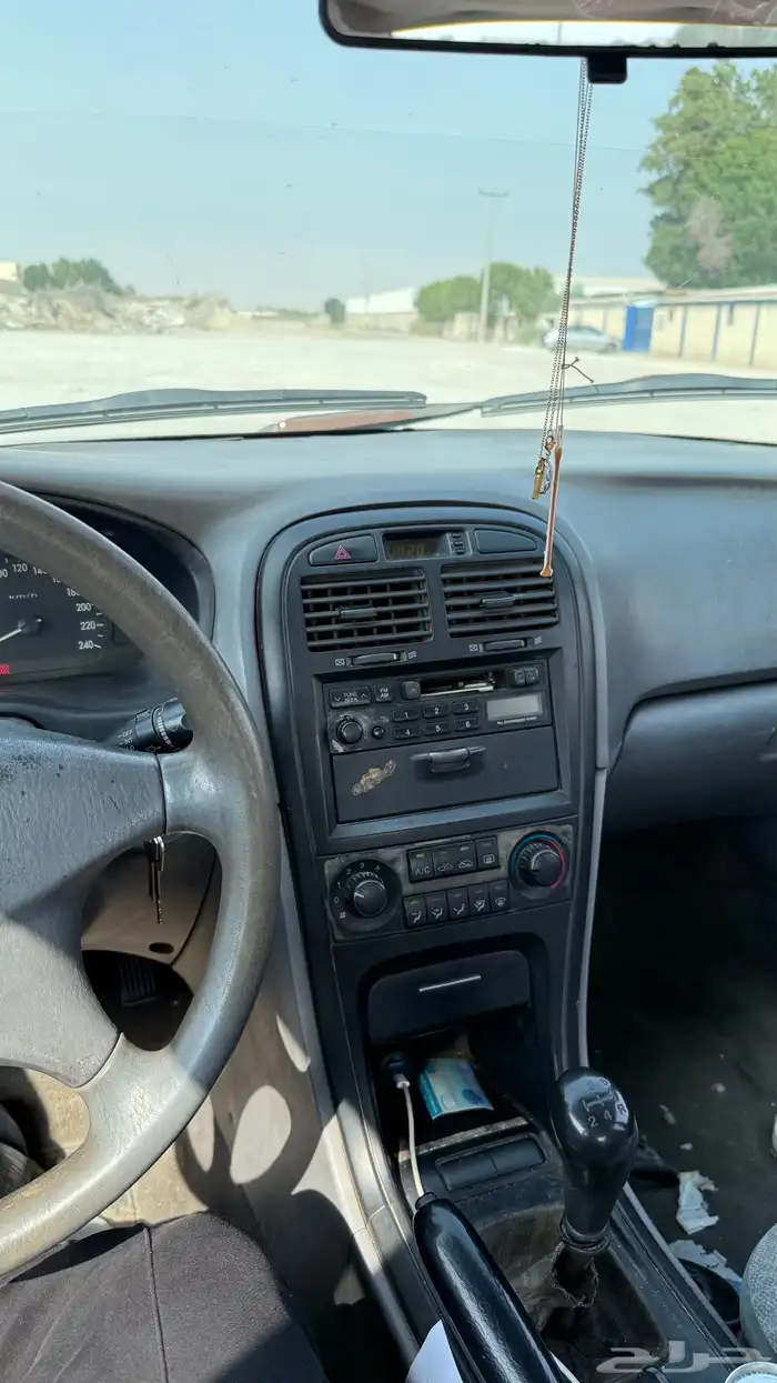 للبيع أوبتيما 2004 قير عادي مخزنه 12